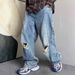 Herrenbekleidung Frühling und Sommer Lässige Retro Hellblaue zerrissene Jeans Herren Gerade Lose Trendy Tapered Pants_voghion.com