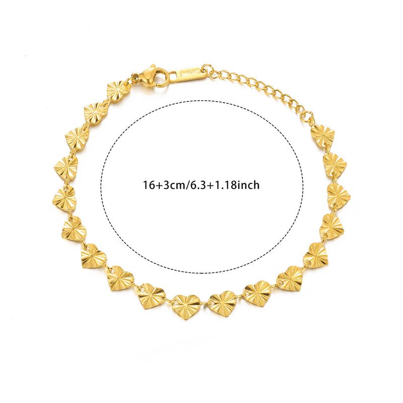 Cavigliera a doppio strato, versatile ed elegante, con catena da spiaggia e bracciale in oro_voghion.com