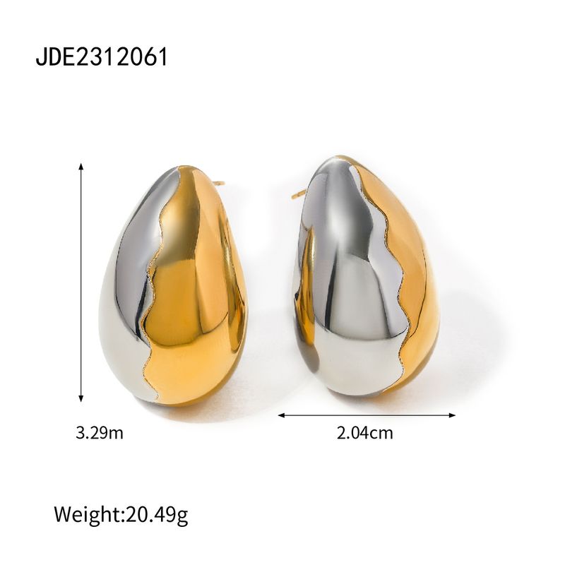 Die Edelstahlwelle des JD-Designers mit einem Nischendesigngefühl, unterteilt in gold- und silberfarbene Wassertropfen_voghion.com