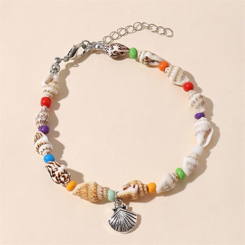 Nova pulseira com pingente de concha de arroz e estrela do mar, praia e oceano_voghion.com