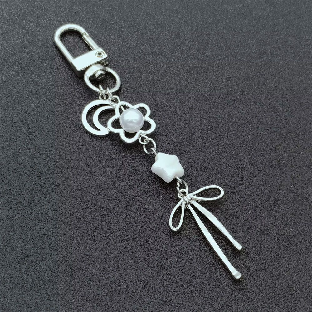 Portachiavi con ciondolo a forma di cuore bianco, stile Y2K, dolce e alla moda, per cellulare e auricolari, con fiocchi_voghion.com