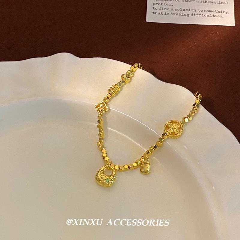 Ancient Method Wrapped Gold Tuotuo 2024 New Personalized Ethnic Style Versatile Bell Broken Silver Bracelet For Women_voghion.com