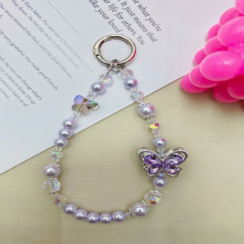 Paquetes y conjuntos de accesorios para teléfono, nuevos, de alta calidad, con forma de mariposa de diamante, aleación de cinco estrellas, cuentas de colores, cadena para teléfono móvil, bolso colgante para coche, cordón colgante corto._voghion.com