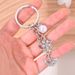 Portachiavi per auto con ciondolo per borsa versatile, stella e luna intarsiate con diamanti e perle, decorazione fai da te_voghion.com