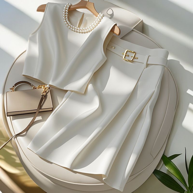 Elegantes zweiteiliges Sommer-Outfit für Damen mit ärmellosem Oberteil und langem Rock – fließender Freizeitanzug in Petite- und Übergröße fürs Büro und zum Ausgehen_voghion.com