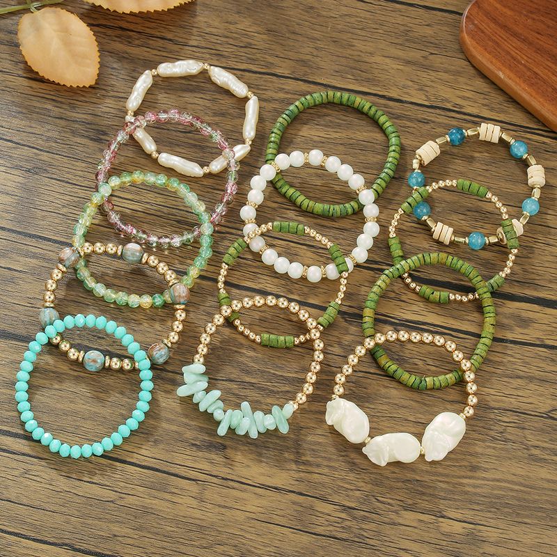 Bracelet bohème multicouche en perles de cristal et coquillages de noix de coco, style baroque, fait main, pour femme_voghion.com