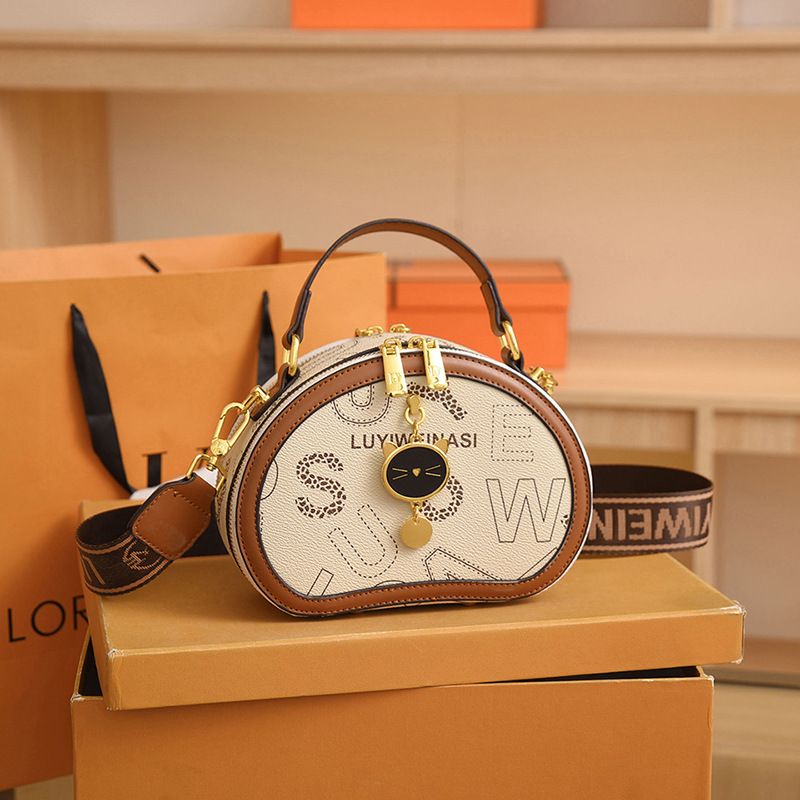 2023 Nuova borsa stampata vintage Borsa di lusso leggera Borsa da donna a tracolla monospalla versatile di alta qualità_voghion.com