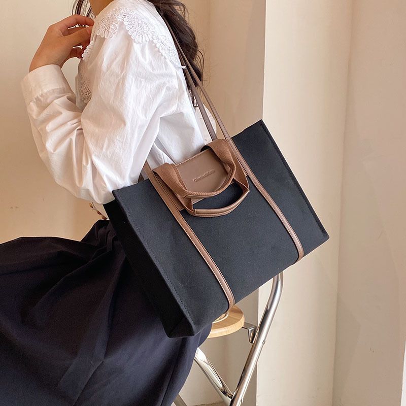 Canvas-Tasche Großhandel große Kapazität Farbkontrast Umhängetasche 2023 Grenzüberschreitende neue Handtasche Trend Mode Einkaufstasche_voghion.com