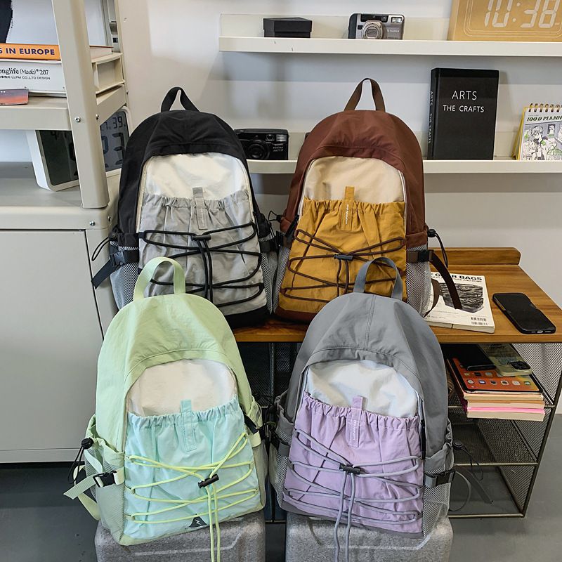 Sac à dos léger et fin pour homme et femme, idéal pour la randonnée, le voyage ou l'école._voghion.com