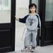 Nuova moda per bambini e bambine di mezza età, 2025, nuovi pantaloni a maniche lunghe con cerniera a costine e piccoli asciugamani, set da due pezzi_voghion.com