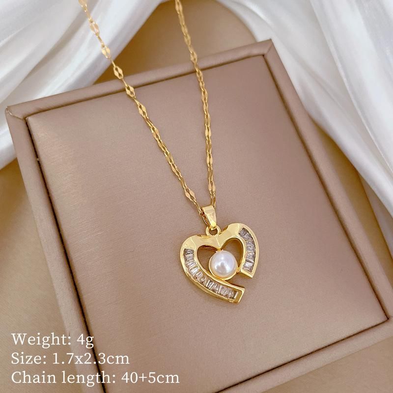Collana con ciondolo con orecchini di perle a forma di cuore d'amore per le donne, set di gioielli con catena in acciaio inossidabile di lusso alla moda_voghion.com
