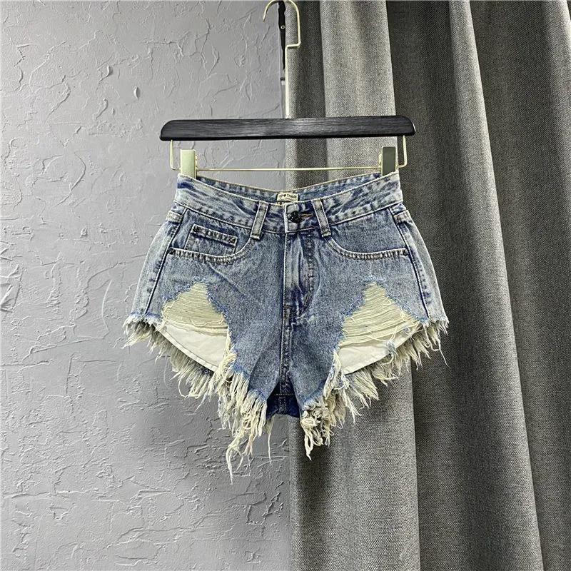 Îmbrăcăminte pentru femei Pantaloni scurți cu talie joasă Moda pentru femei Pantaloni cu margini brute Noua vară Blugi albi rupți în linie Pantaloni fierbinți Trend_voghion.com