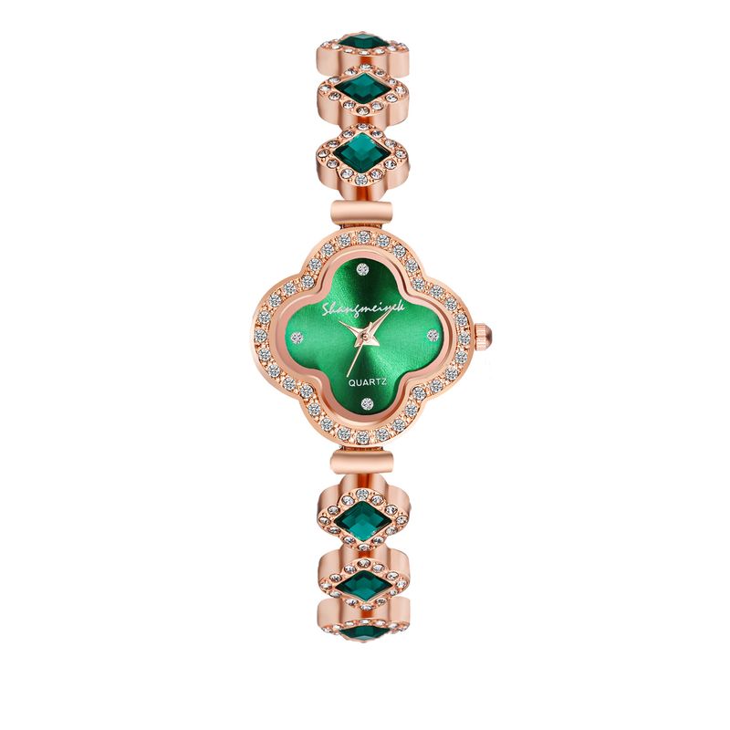 Montre pour femme en alliage de trèfle à quatre feuilles, bracelet de décoration à la mode, quartz vert, diffusion en direct_voghion.com