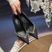 Schwarze Pendlerschuhe aus Satin mit spitzem Absatz und Strasssteinen sowie dünner Ferse_voghion.com