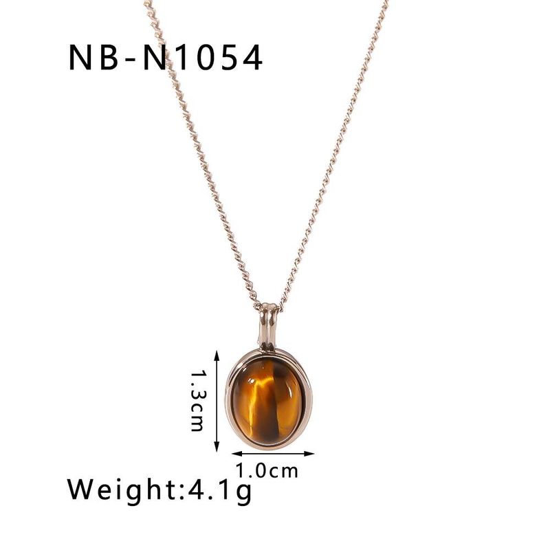 French retro style fashion simple stainless steel plated gold pendant inlaid with natural tiger eye stone necklace women everything_voghion.com