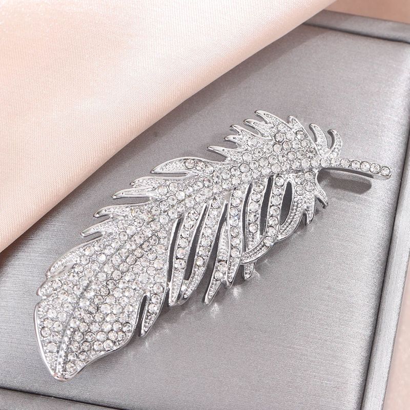Korean version feather brooch for women with a sense luxury and niche inlay of zircon chest flower temperament, suit_voghion.com