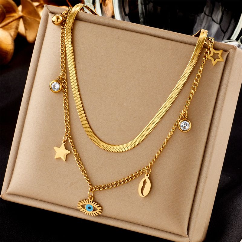 Bijoux de mode transfrontaliers européens et américains, double couche empilable, coquille d'étoile en acier titane, pendentif oeil creux, collier de clavicule_voghion.com