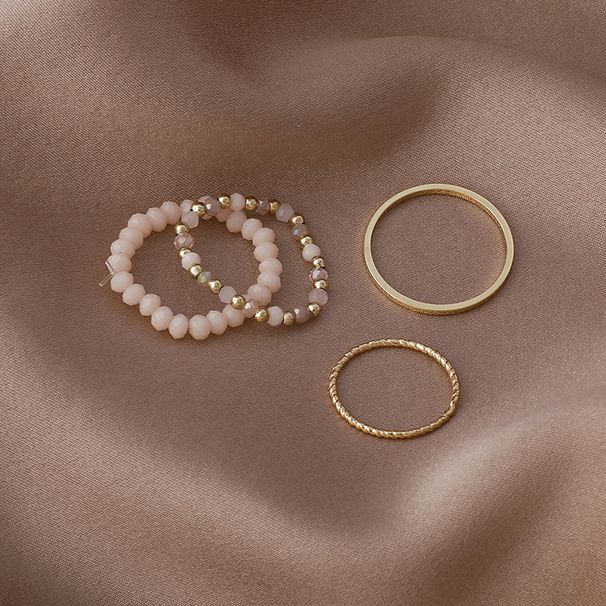 Nuovo set di quattro pezzi in stile coreano con anello di perline di cristallo colorato impilato da indossare, anello retrò, set di quattro pezzi per donna_voghion.com
