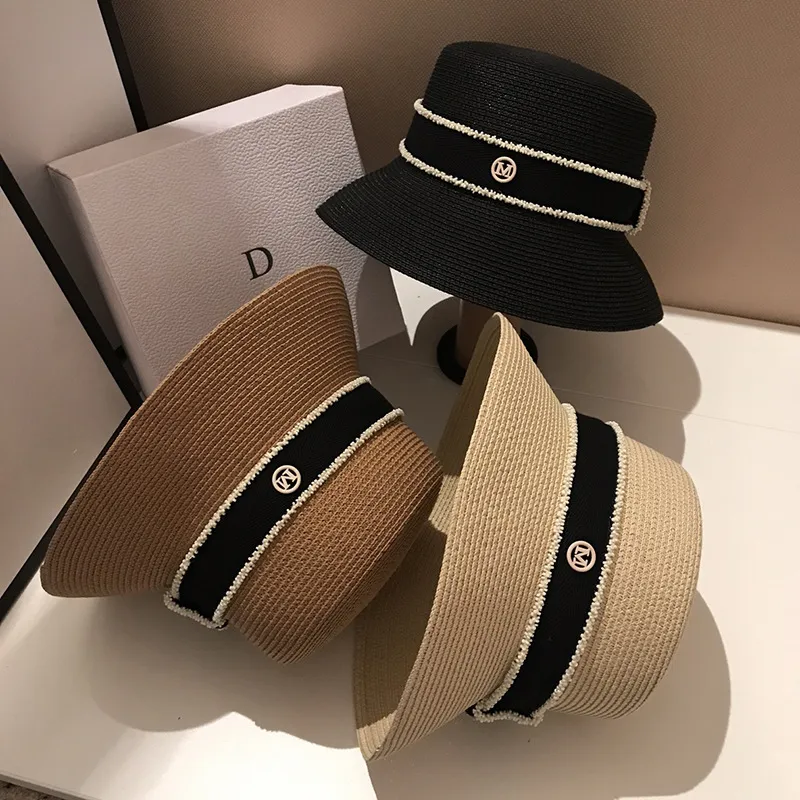 Gorąca sprzedaż Gorąca sprzedaż Nowe letnie słomkowe kapelusze przeciwsłoneczne dla kobiet Moda damska Płaskie rondo Wstążka Plażowa Czapka podróżna Chapeau Femme Kapelusz typu Bucket_voghion.com