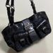 Ins Same Hundred Biker Multi-Pocket Shoulder Armpit Spice Girls Women's Bag 2025 Spring Summer New Trend Fashion Hundred Casual Daily_voghion.com