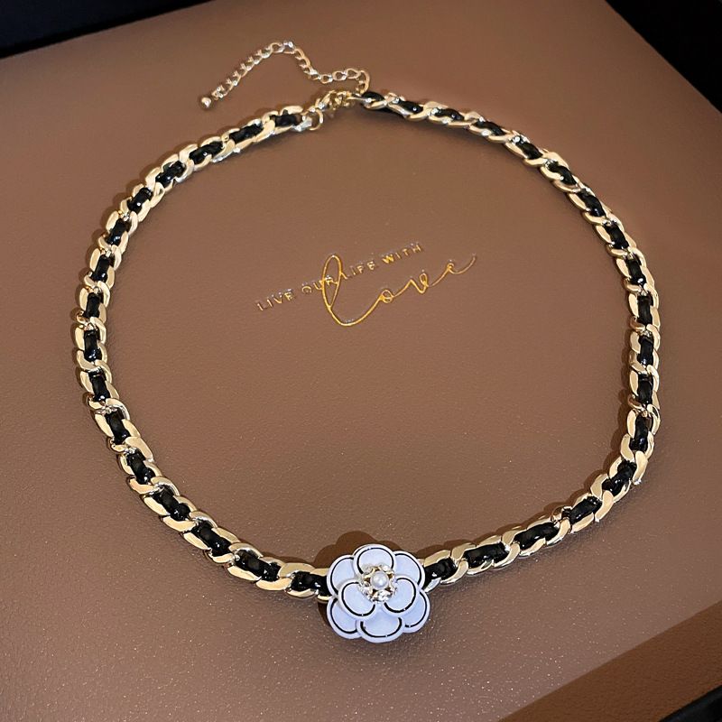 Designer light luxury diamond pearl leather winding necklace high touch camellia pendant clavicle chain French style necklaces for girls_voghion.com