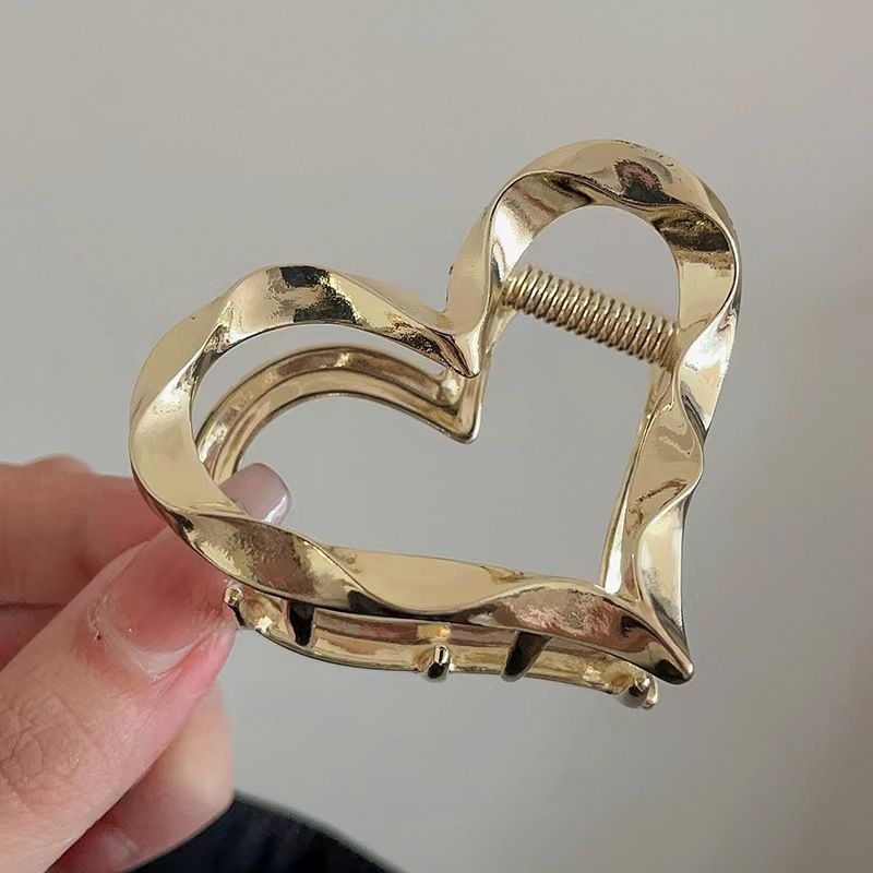 Horquilla de metal con forma de corazón para mujer, versión coreana, con temperamento, para la parte trasera del cabello, con disco de sentido avanzado, accesorios para el cabello_voghion.com