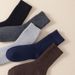 A pair of cold resistant wool socks, thickened socks, men's mid tube socks, winter plus velvet warm terry socks, cashmere socks_voghion.com