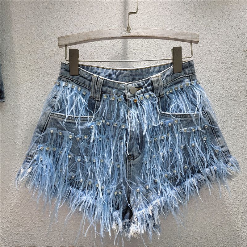 Abbigliamento da donna Pantaloncini di jeans all-in-one alla moda con frange dimagranti in capelli di struzzo con diamanti pesanti_voghion.com