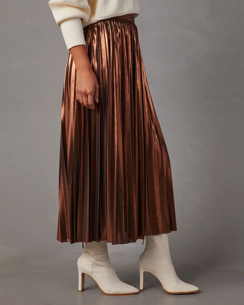 Moda femminile a vita alta Una parola nella lunga gonna a pieghe dorata_voghion.com