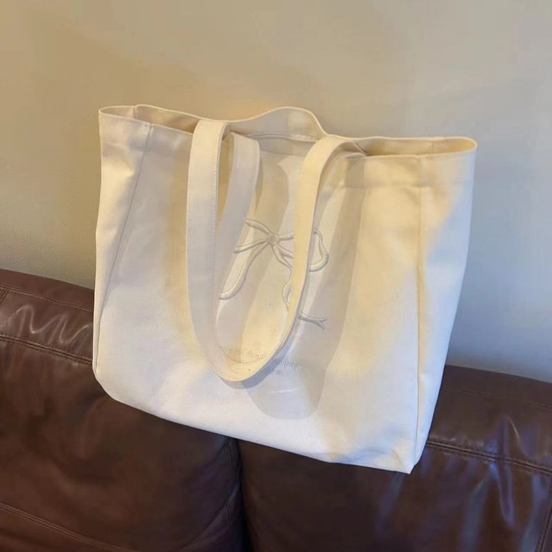 Borsa a tracolla in tela con fiocco ricamato, grande capacità, stile 2025._voghion.com