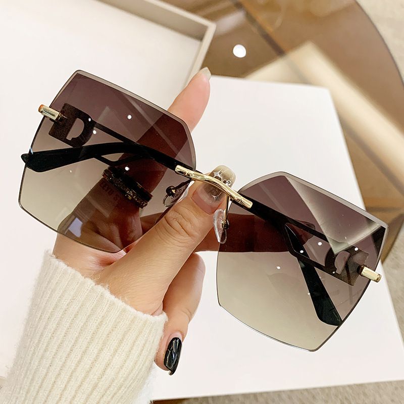 Women's trend rimless cut edge fashion driving travel glasses advanced feeling sunglasses_voghion.com