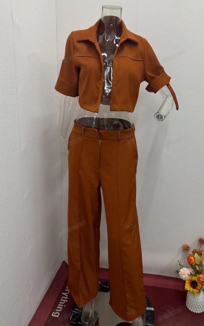 Pantaloni da donna slim a gamba larga slim a vita alta con risvolto in tinta unita da donna_voghion.com