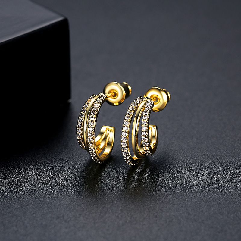 Orecchini da donna in oro con micro intarsi in rame e zirconi, orecchini di nicchia dal design raffinato e di piccole dimensioni_voghion.com