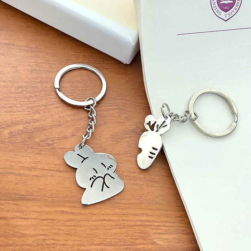 Portachiavi in acciaio inossidabile 304 con ciondolo a forma di coniglio e carota, stile coppia, un paio di simpatici cartoni animati._voghion.com