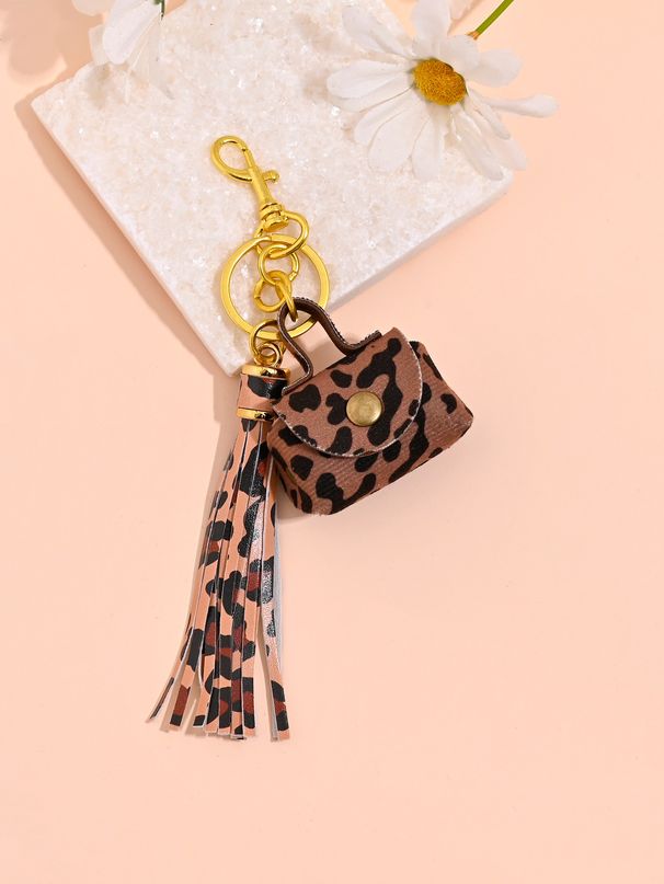 Portachiavi regalo con ciondolo per auto con borsa alla moda e nappa con stampa leopardata_voghion.com