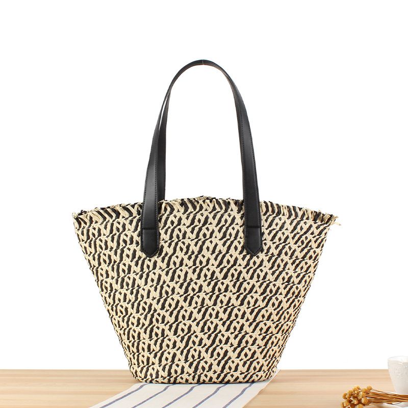 Borse da donna One Piece Drop Shipping Nuova borsa intrecciata in corda di paglia bicolore Borsa a tracolla alla moda per pendolari di grande capacità Borsa a secchiello con cestino di verdure_voghion.com