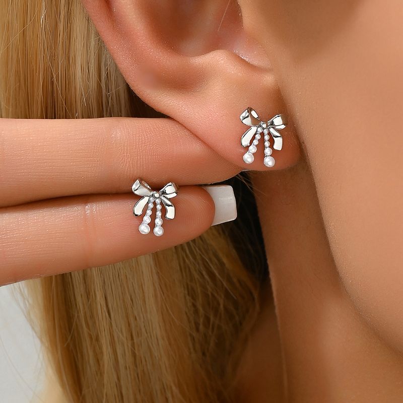 Japanese and Korean fresh, sweet, cool, spicy girl style for women, niche, inlaid with pearls, bow earrings, versatile,_voghion.com