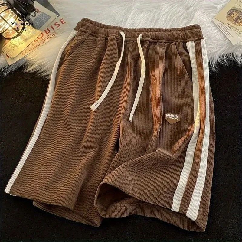 Vêtements pour hommes rétro rayé shorts de sport hommes et femmes été décontracté lâche basket-ball couple polyvalent cinq points pantalon_voghion.com