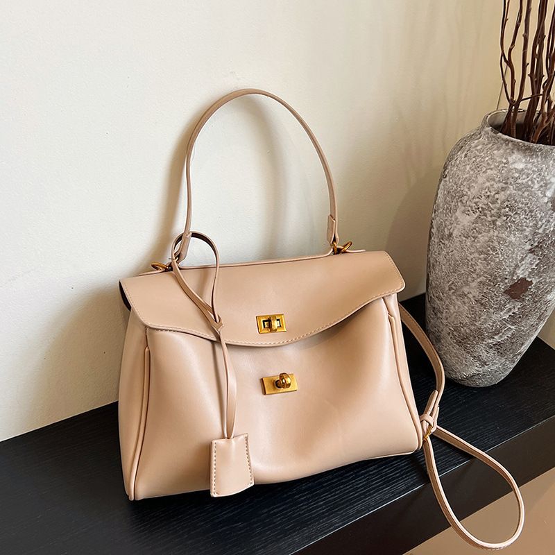 Hand held platinum tas voor vrouwen 2024 nieuwe stijl Koreaanse niche oksel tas high-end stijlvolle grote capaciteit forenzen tas_voghion.com