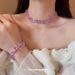 Set di collana e bracciale con cristalli viola iridescenti irregolari, dolce catena per clavicola personalizzata, lusso leggero e_voghion.com