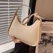 Niche Design Underarm Bag Jingle 2023 New Summer Fashion Portable Small Satchel high-level sense Messenger shoulder bag_voghion.com