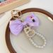 Fashion Korean Version 5-Word Pearl String Lipstick Bow Car Bag Pendant Girl Keychain Ring_voghion.com