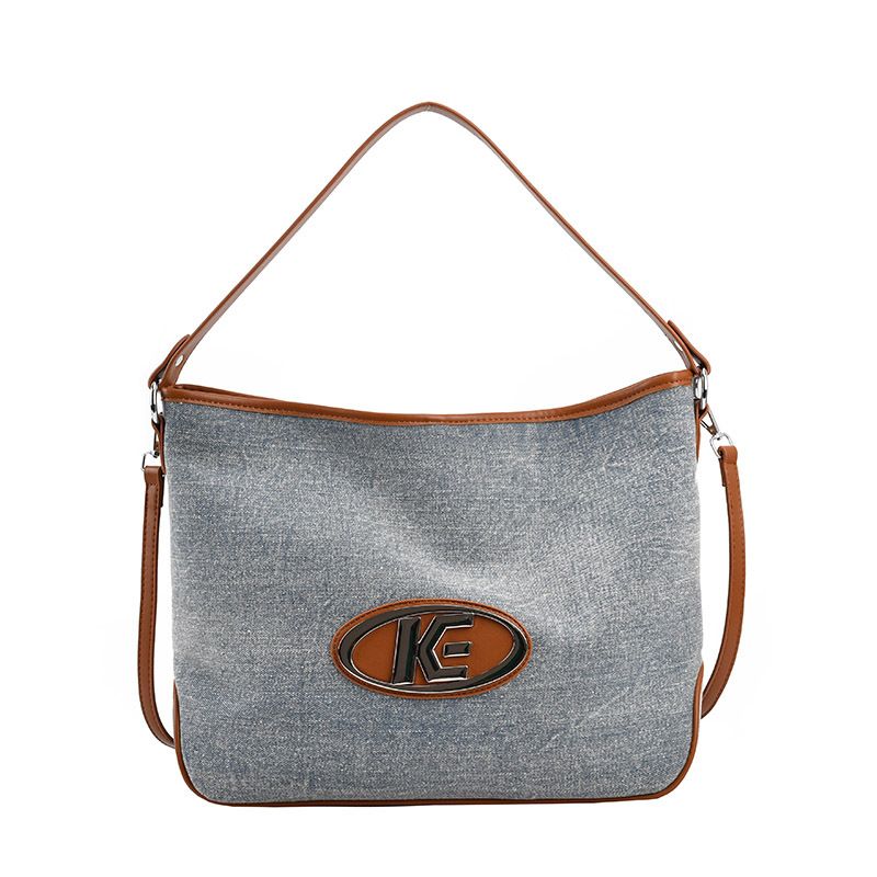 Nieuwe high-end brief schoudertas grensoverschrijdende explosieve stijl canvas draagtas diagonale damestas met grote capaciteit onderarmtas_voghion.com