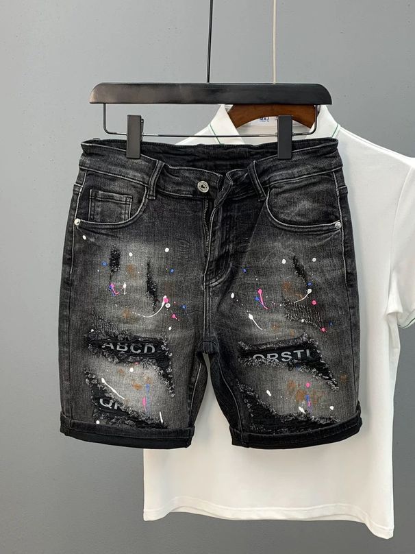 2025 Lente en zomermode voor heren, gewassen, gescheurd, gepatcht, met inktspatten, slim fit, kleine voet, grijszwarte denim shorts voor heren_voghion.com
