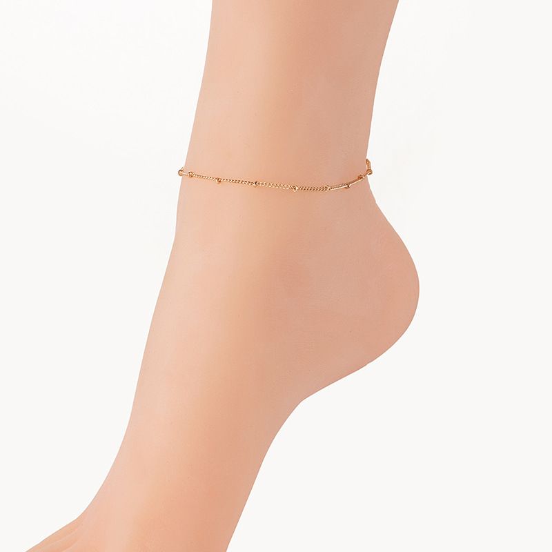 Cavigliera da spiaggia estiva con bracciale multistrato regolabile in oro e argento, semplice catena fatta a mano da donna_voghion.com
