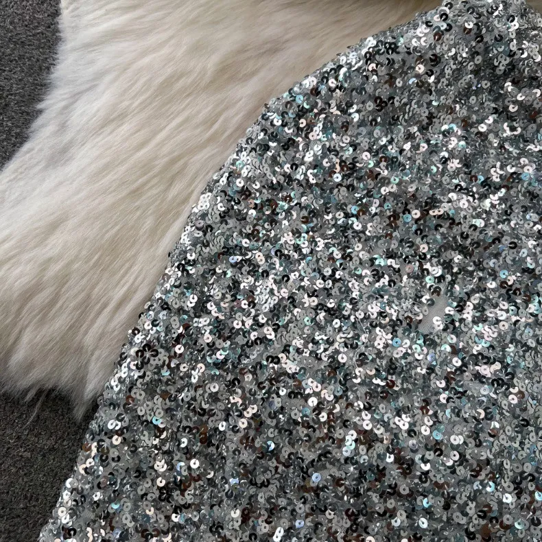 Vêtements pour femmes Costume à la mode, tempérament féminin, chemise brillante à manches longues et col en V avec ourlet en feuille de lotus pour femmes, jupe à paillettes taille haute_voghion.com