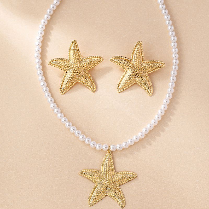 Collier pendentif étoile de mer en perles populaires, boucles d'oreilles étoile de mer, tempérament léger, luxe élégant, ensemble d'accessoires polyvalents, vente à chaud_voghion.com