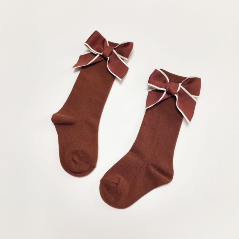 2024 New Spanish European and American style white bow handmade boneless sewing head Children's women's socks_voghion.com