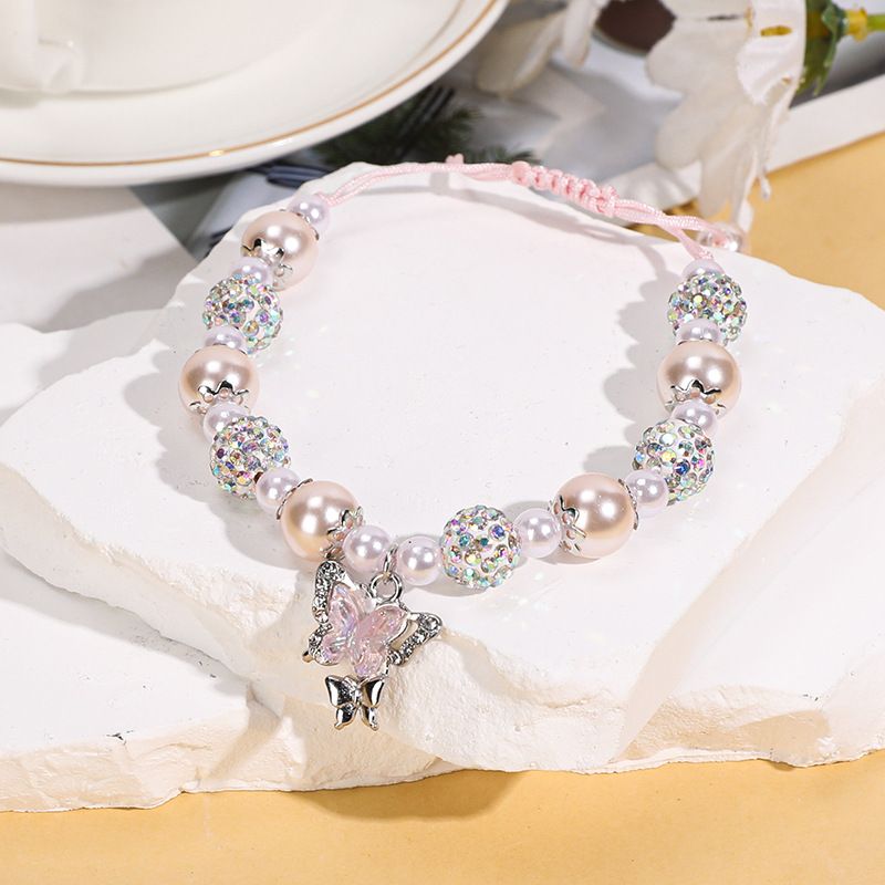 Braccialetto con ciondolo a farfalla intrecciato a mano in argilla morbida Shamballa con perle rosa intarsiate, molto venduto_voghion.com
