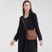 2025 Spring And Summer New Mini Saddle Multifunctional Large Capacity High-end Chestnut Color Ladies Shoulder Crossbody Bag_voghion.com